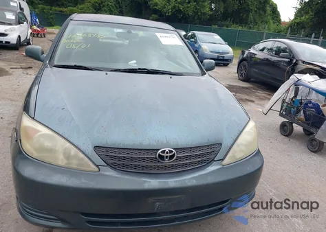 2002 Toyota Camry Xle z USA, uszkodzony, nr VIN 4T1BE30K22U611331